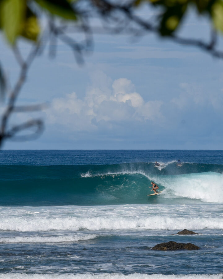 girl surfing left on playa negra wave