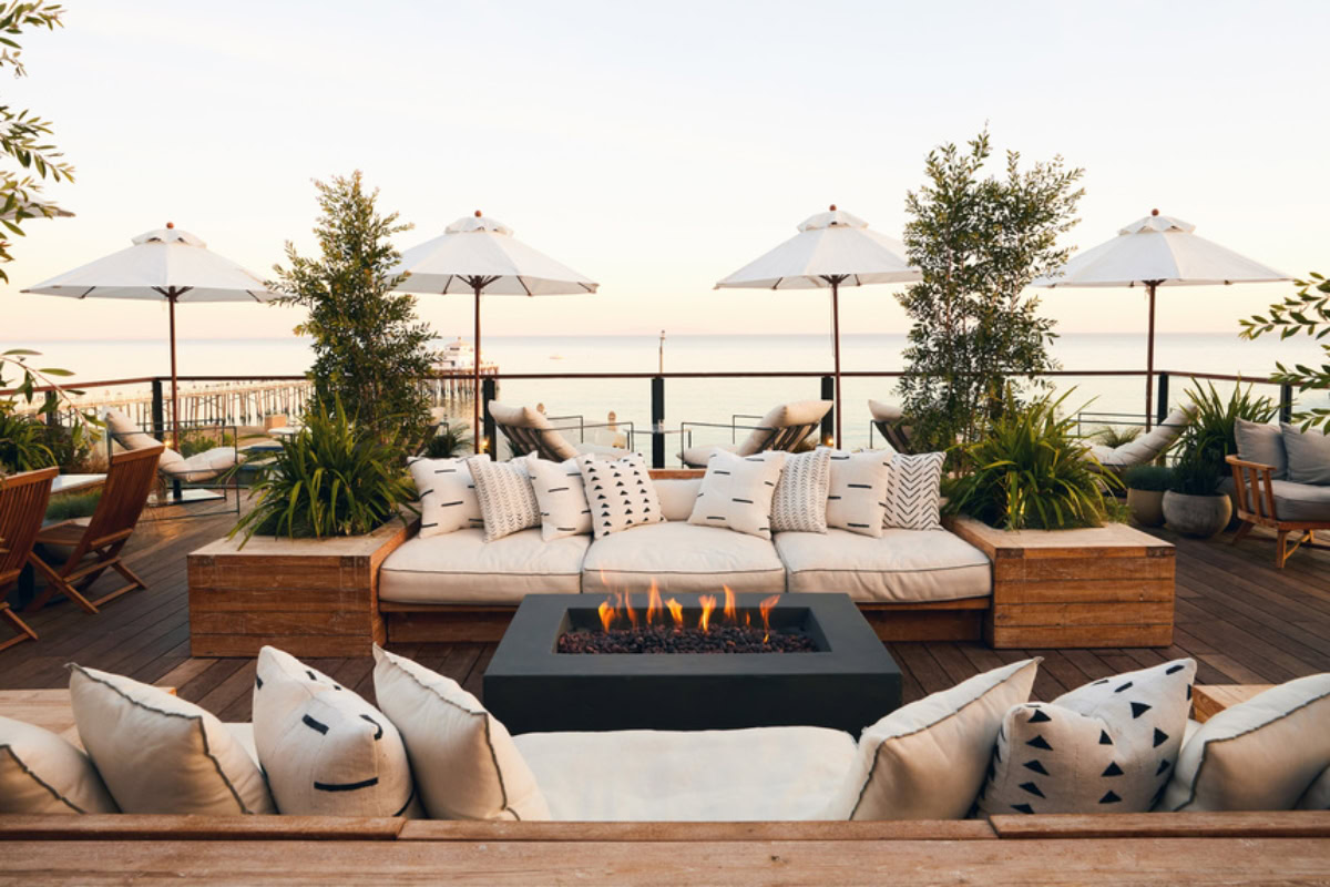 Oceanview balcony with cushioned loungers